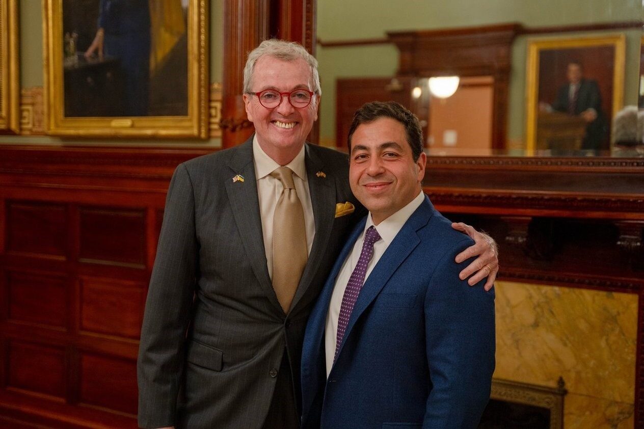 New Jersey Gov. Phil Murphy, left, appears with his former chief of staff George Helmy in a photo distributed in September 2023, when he announced Helmy's departure from that position. 