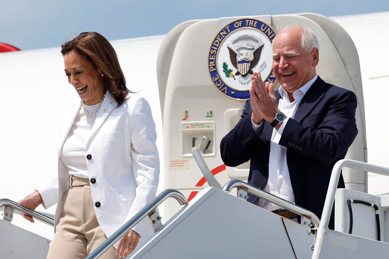 Democratic presidential candidate Kamala Harris and her running mate, Minnesota Gov. Tim Walz, arrive at Chippewa Valley Regional Airport in Eau Claire, Wis., on Wednesday.