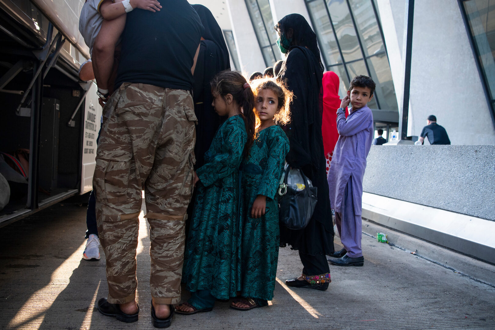 People arrive at Dulles International Airport on Aug. 27, 2021, after leaving Afghanistan as it fell to the Taliban. A new report details how congressional offices handled constituent services during the crisis.