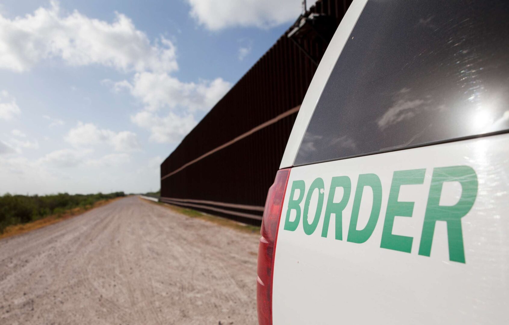 A Customs and Border Protection vehicle patrols the border wall in Texas in 2019. 