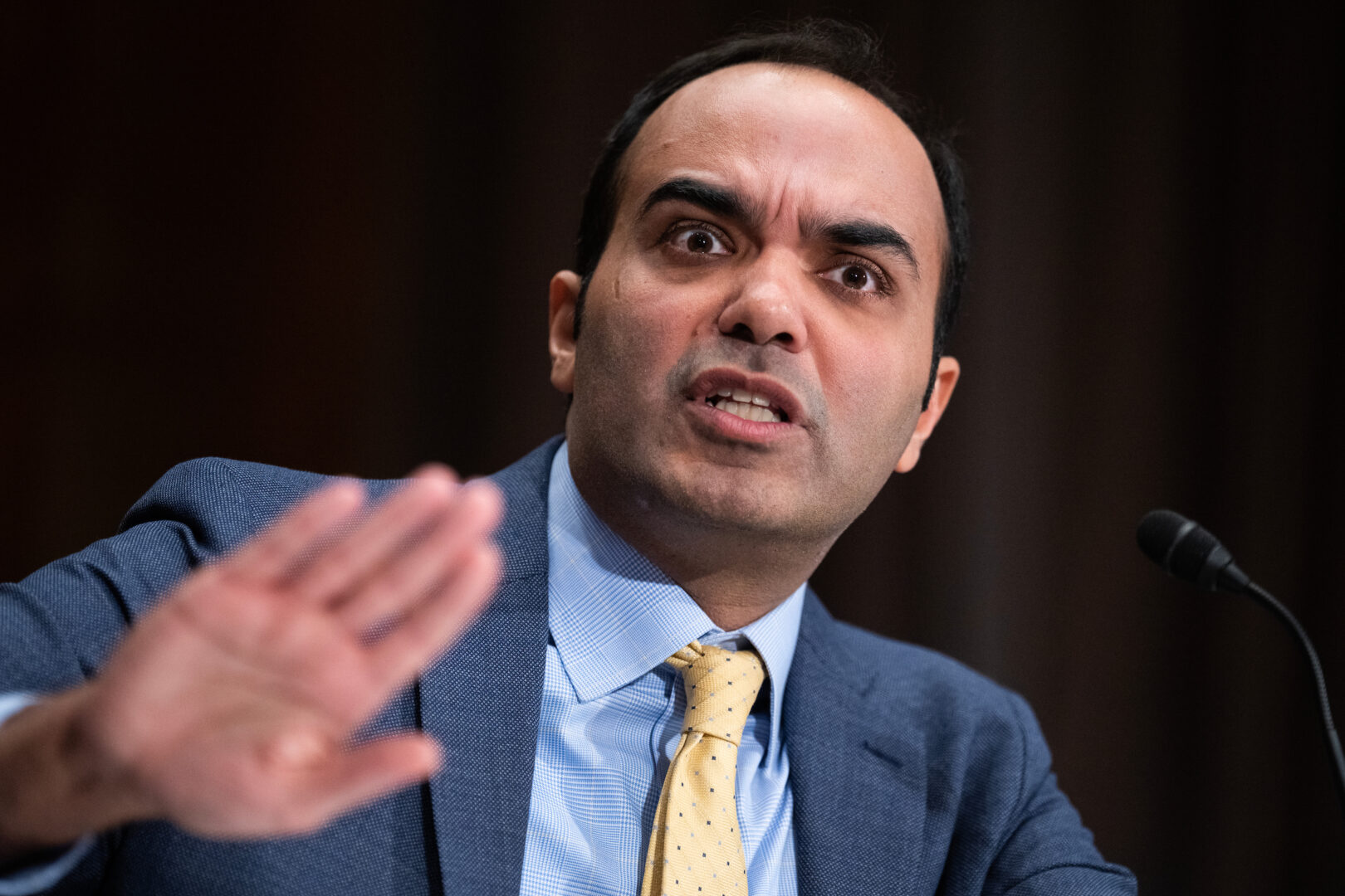 Rohit Chopra, director of the CFPB, testifies during a Senate Banking Committee hearing last November. Chopra was part of a Tuesday call announcing a proposed rule that would bar credit reporting agencies from including medical debt on credit reports sent to lenders.