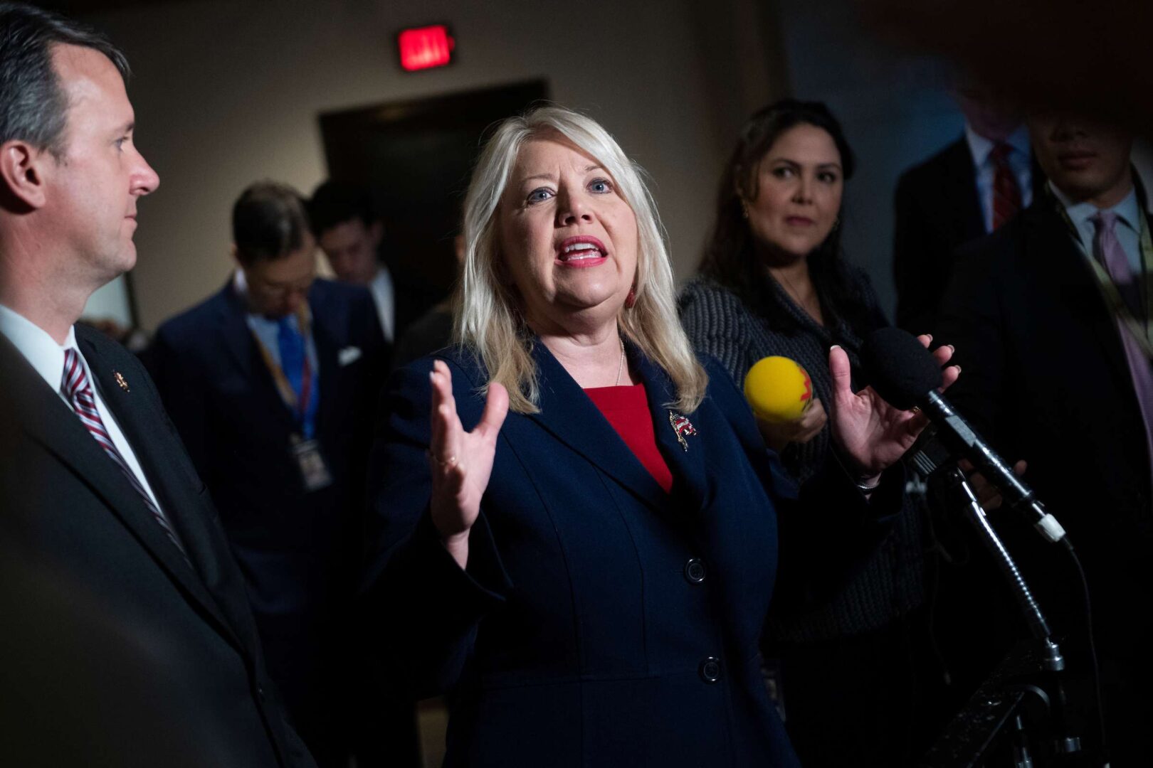 Rep. Debbie Lesko, R-Ariz., talks with reporters outside the deposition of Laura Cooper, deputy assistant secretary of defense, during the House's impeachment inquiry into President Donald Trump in October 2019.