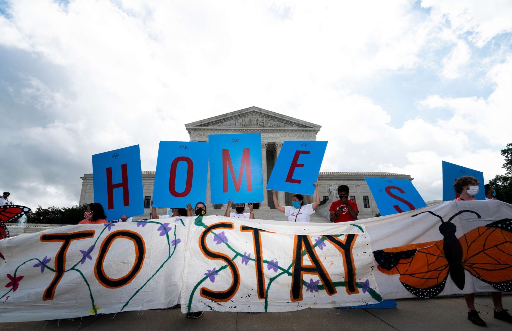 DACA supporters rally outside of the Supreme Court in 2020, part of the legal uncertainty that has followed the Obama-era program in the decade since it was put in place.