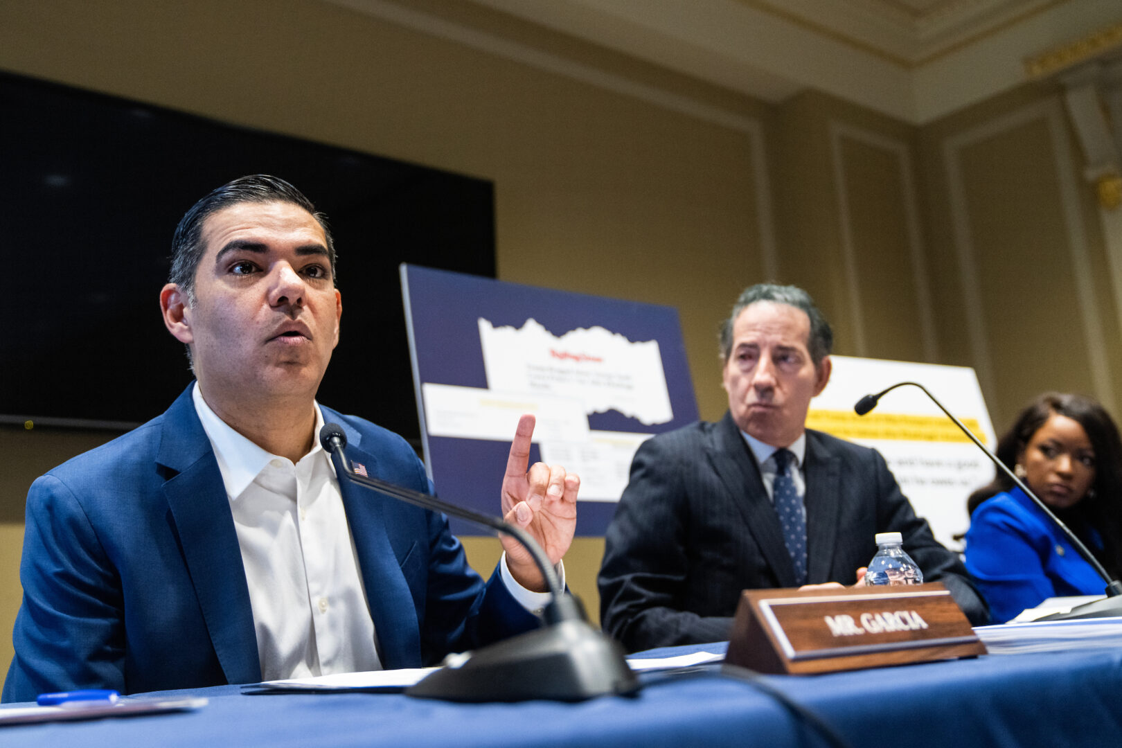 From left, Reps. Robert Garcia, Jamie Raskin and Jasmine Crockett conduct a news conference Thursday on a report by House Oversight and Accountability Democrats on a “multi-year investigation into payments accepted by former President Trump’s businesses from foreign governments during his term in office, in violation of the Constitution.”