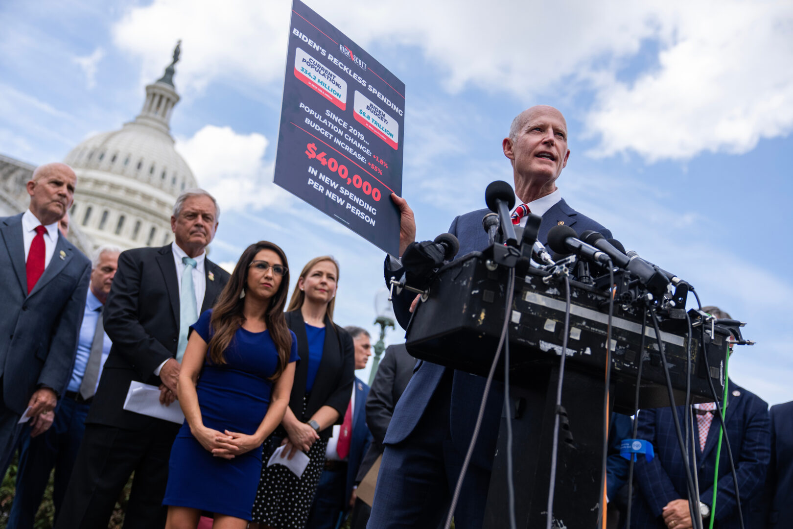 Sen. Rick Scott, R-Fla., conducts a news conference with members of the House Freedom Caucus on government funding outside the Capitol on Sept. 12, 2023. 