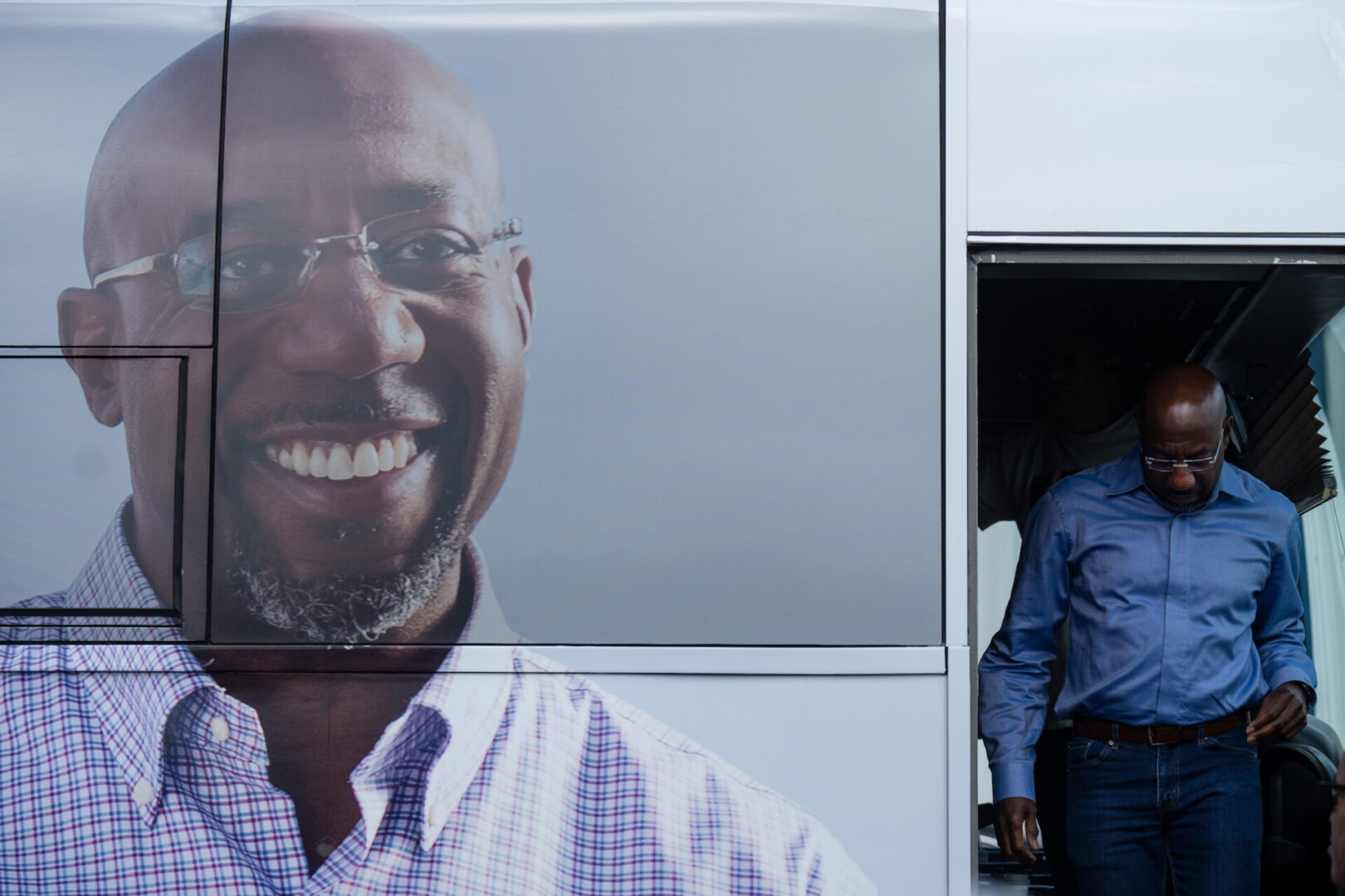 Sen. Raphael Warnock, D-Ga., arrives on his campaign bus campaign for a rally in Grovetown, Ga., on Nov. 5. 