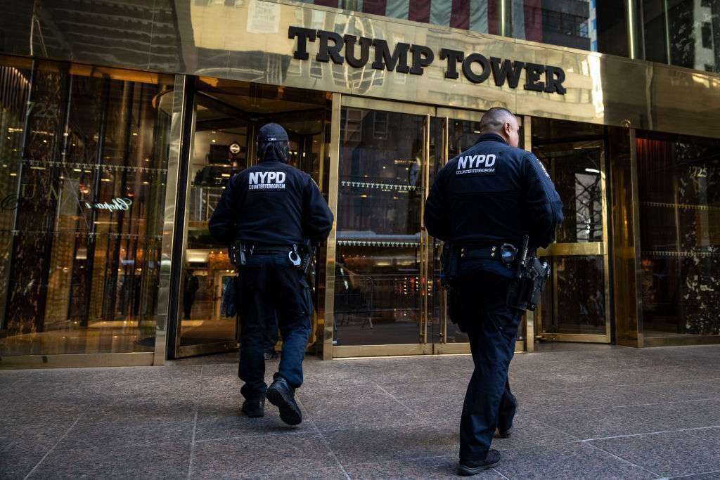 Members of the NYPD Counterterrorism unit patrol outside Trump Tower in New York on Monday, a day before former President Donald Trump is expected to be arraigned at a Manhattan courthouse following his indictment by a grand jury. 