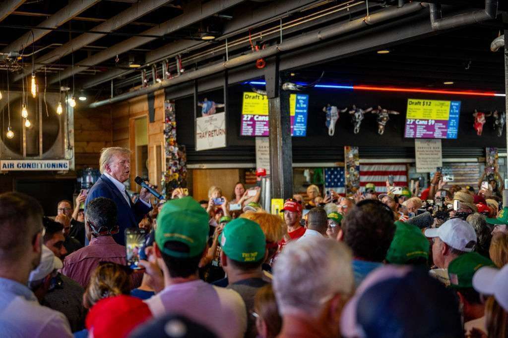 Former President Donald Trump speaks during a rally at the Steer N' Stein bar at the Iowa State Fair on Aug. 12 in Des Moines, Iowa.  