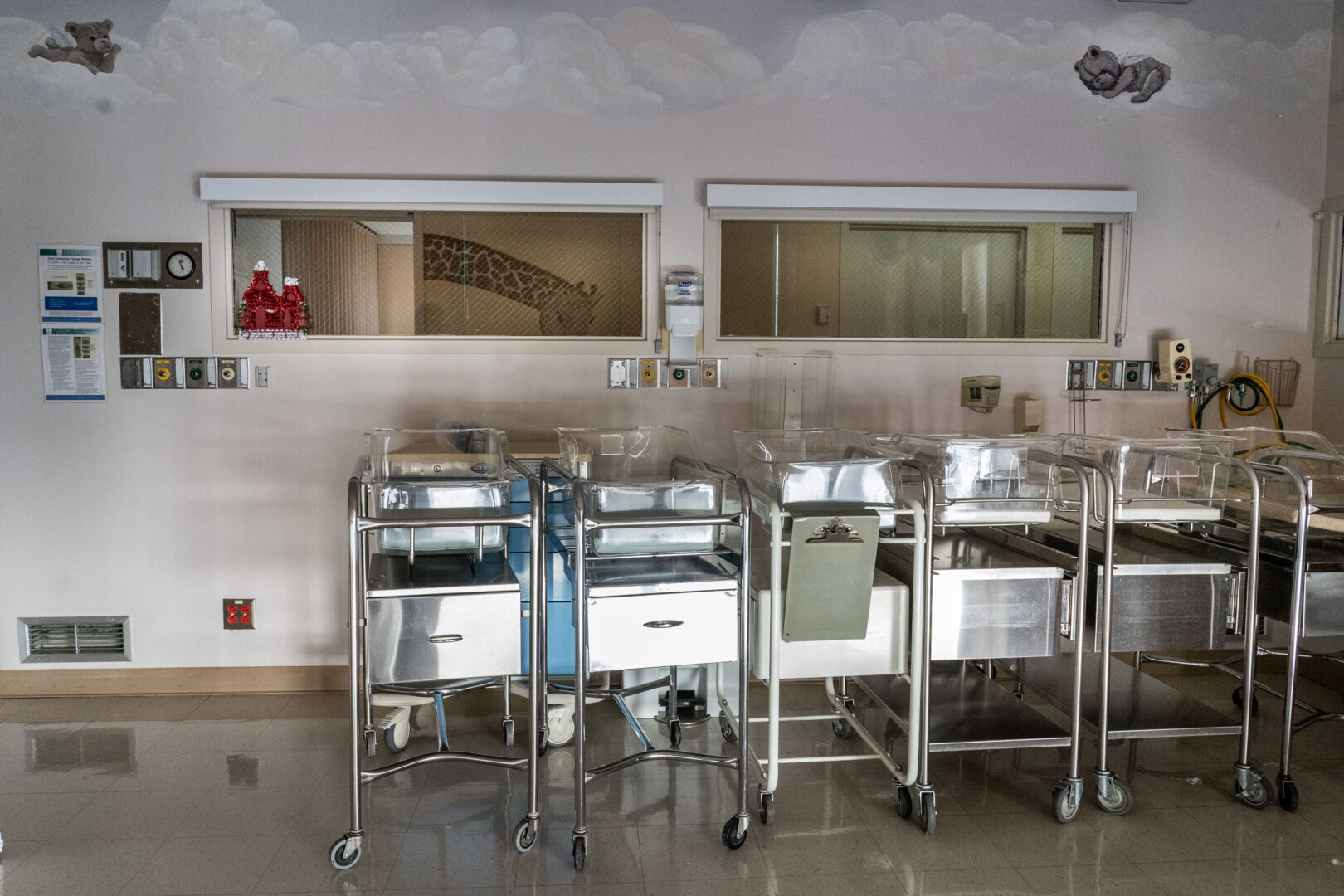 Empty infant beds sit gathered in a corner in a quiet maternity ward at rural Madera Community Hospital, which closed in January 2023, creating a lack of health care services for the blue-collar Central Valley agricultural community in Madera, Calif.