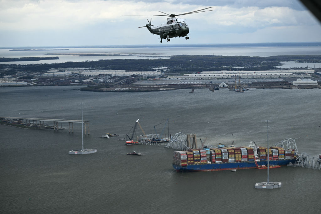 Marine One, carrying President Biden, makes an aerial tour of the collapsed Francis Scott Key Bridge and the container ship Dali in Baltimore on Friday.