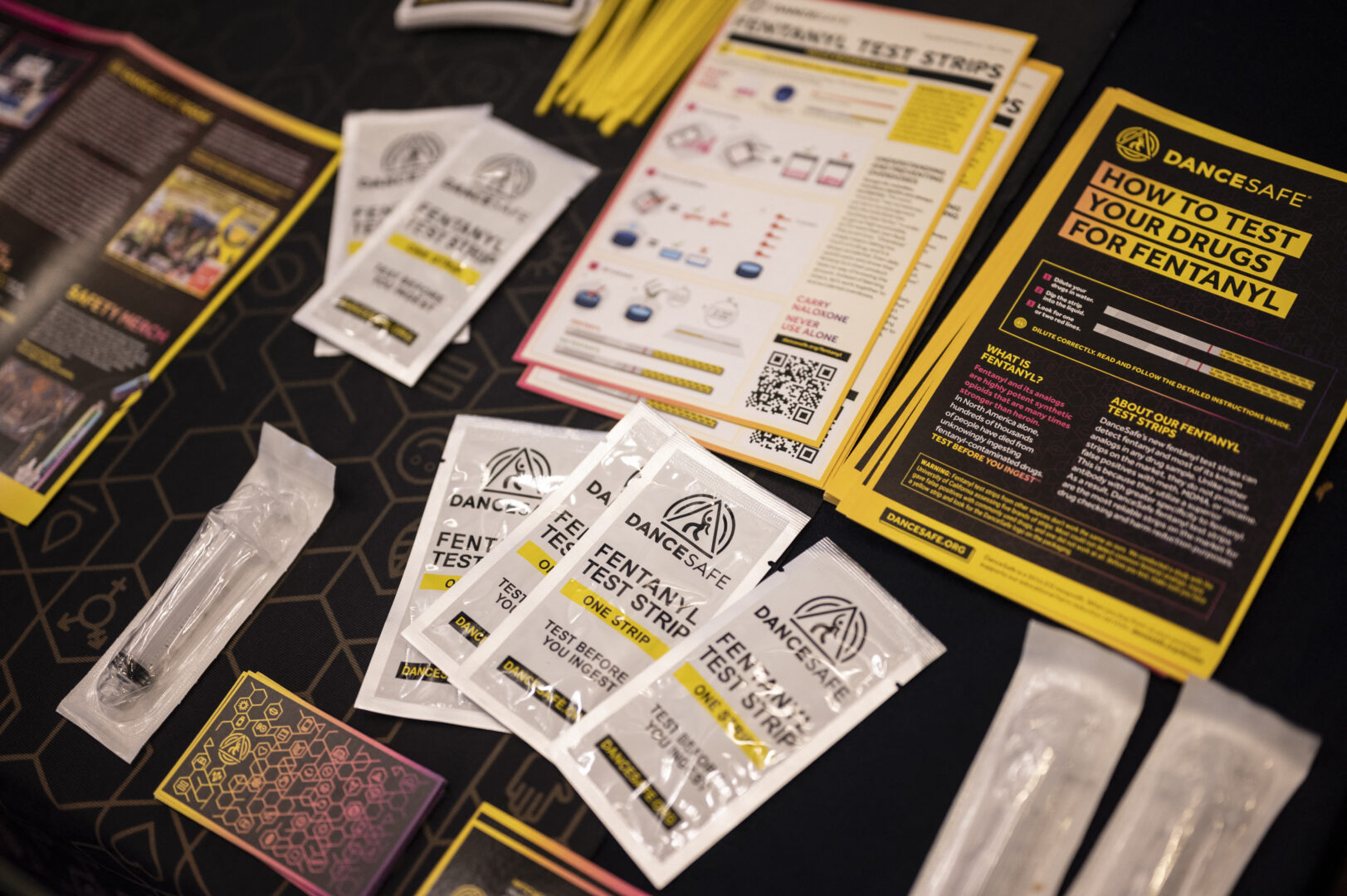 An exhibitor (out of frame) shows attendees a rapid fentanyl detection test during the Multilateral Conference on Synthetic Drugs in Mexico City on April 23.