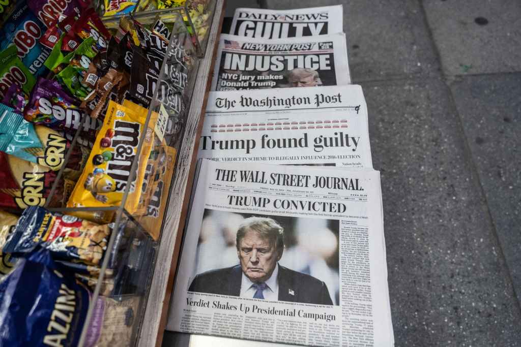 Newspapers reporting on former President Donald Trump’s criminal conviction are for sale near Trump Tower in New York City prior to the presumed Republican presidential nominee holding a news conference on Friday.