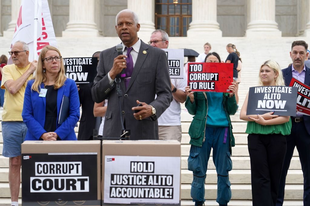 Rep. Hank Johnson, D-Ga., speaks Wednesday during an event at the Supreme Court with MoveOn and progressive organizations whose members are demanding an investigation into Justice Alito.