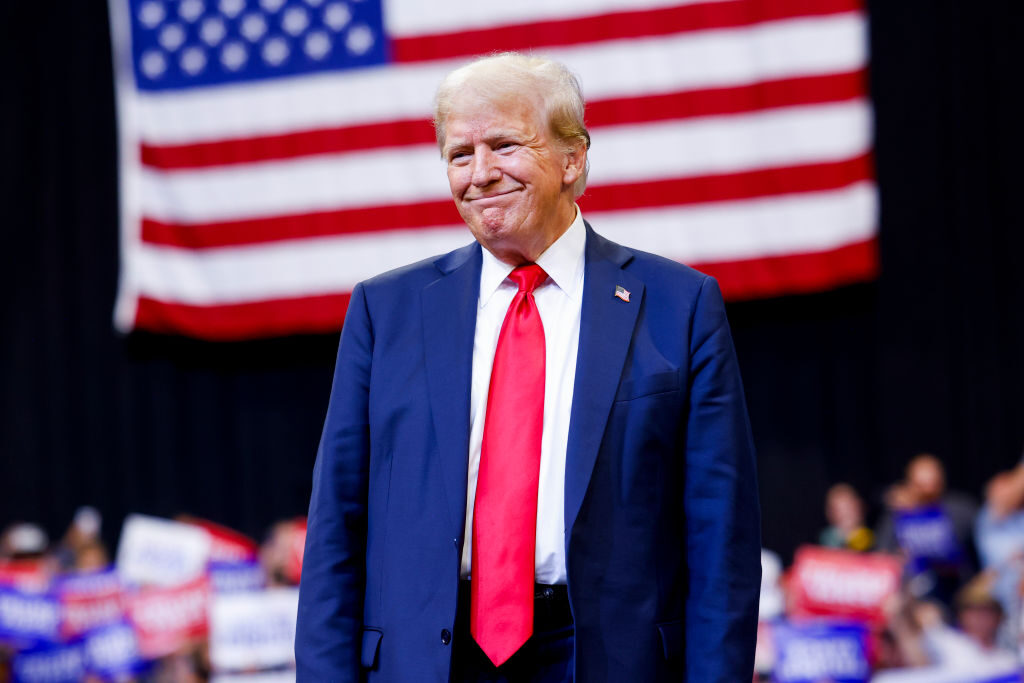 Donald Trump walks toward the stage to speak at a rally at Montana State University on Aug. 9. 