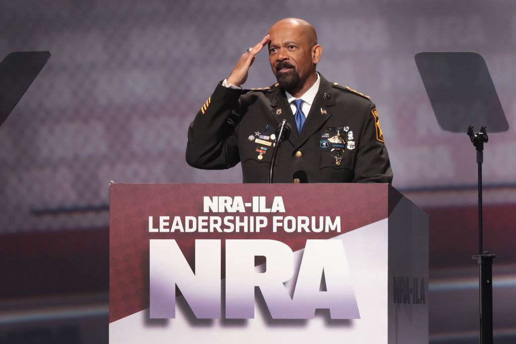 David Clarke Jr., sheriff of Milwaukee County, Wis., speaks at a forum in 2017, the year he called a PAC raising money to encourage him to run for Senate a scam.