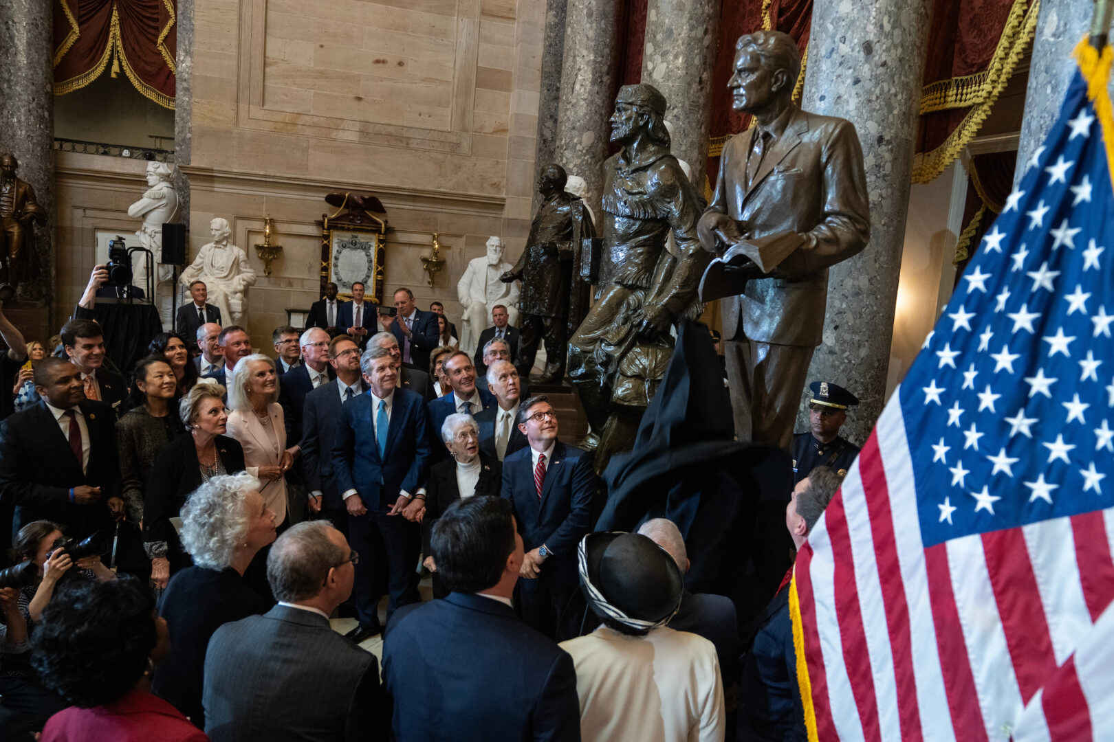 Speaker Mike Johnson joins the North Carolina delegation and family members of Billy Graham to unveil a statue in the Capitol’s Statuary Hall on Thursday.