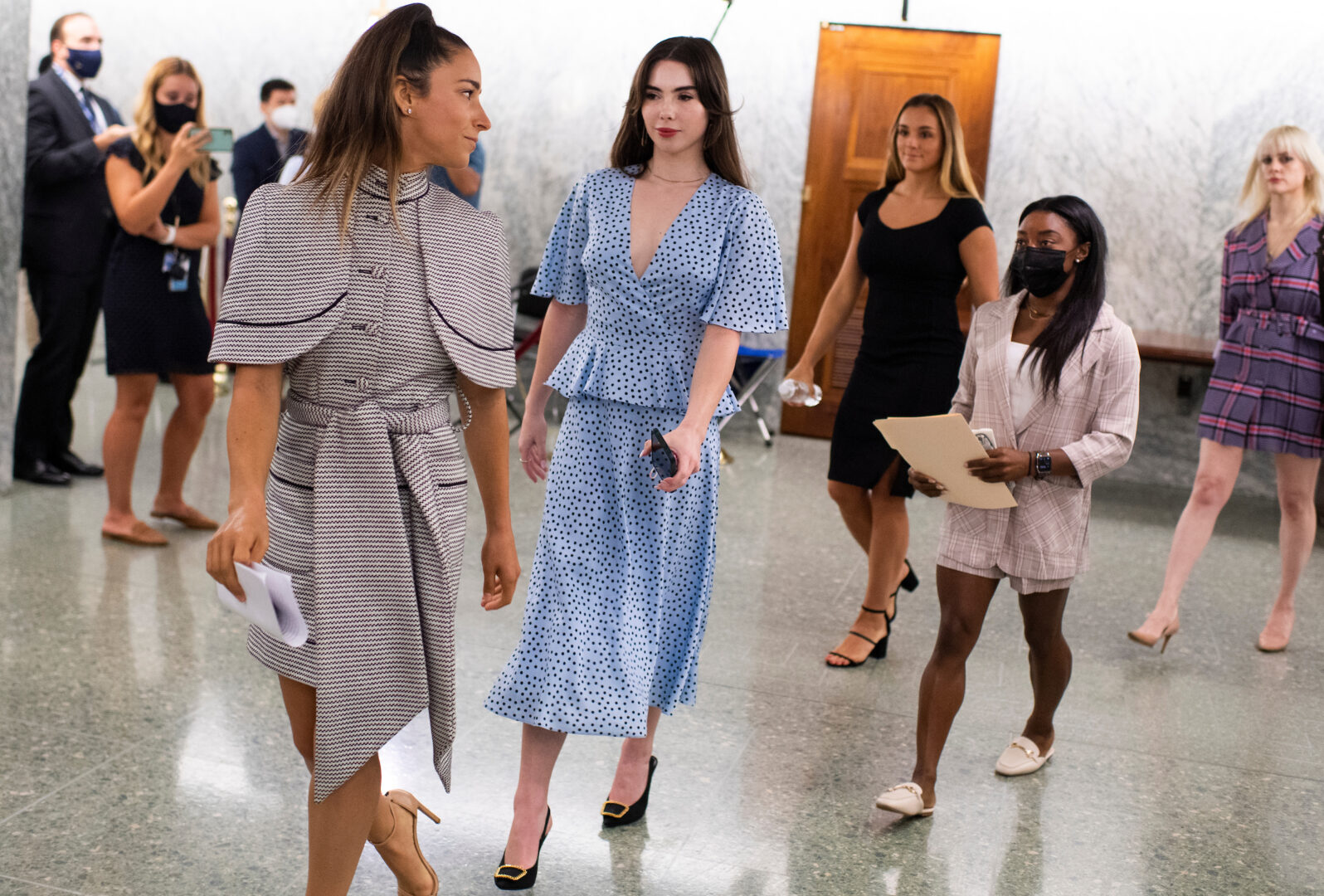 U.S. elite gymnasts from left, Aly Raisman, McKayla Maroney, Maggie Nichols, and Simone Biles arrive to testify during the Senate Judiciary Committee hearing in 2021 on the FBI's handling of the Larry Nassar investigation.