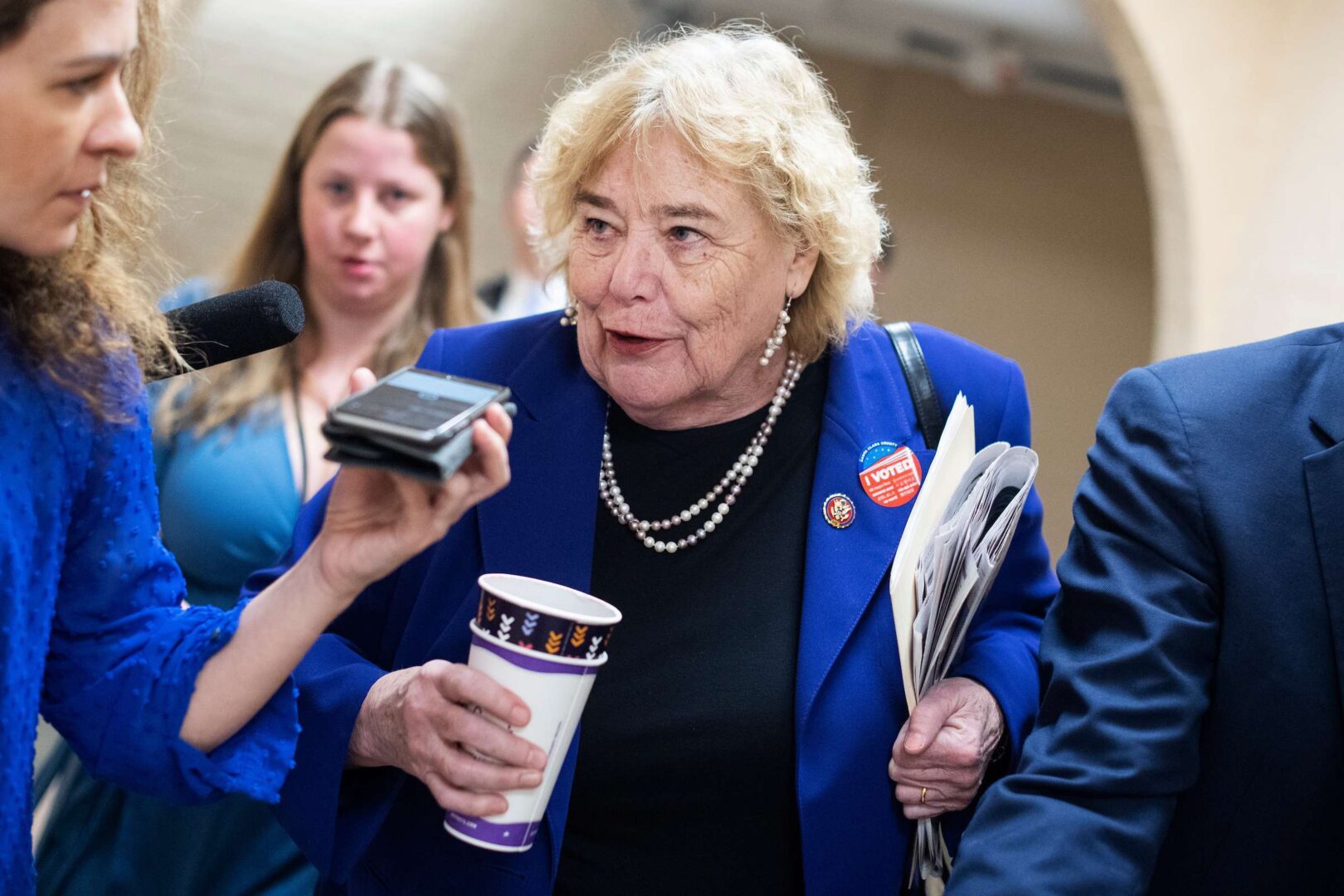 Rep. Zoe Lofgren, D-Calif., talks with reporters after a March 3, 2020, meeting.