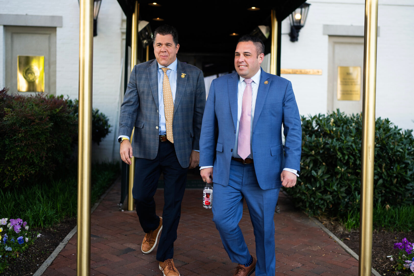 New York Reps. Nick LaLota, left, and Anthony D’Esposito leave a House Republican Conference meeting at the Capitol Hill Club on April 30.