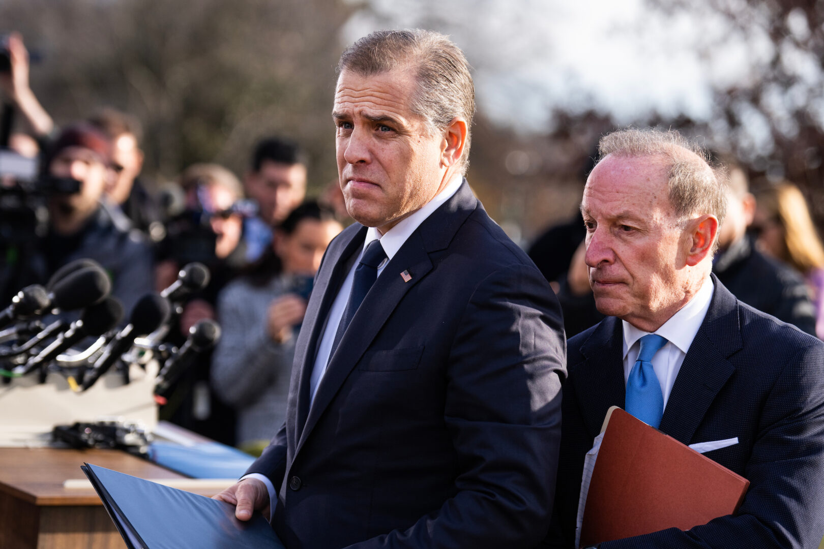 Hunter Biden, left, the son of President Joe Biden, and his lawyer Abbe Lowell, are seen after a news conference Wednesday outside the Capitol about Hunter testifying publicly to the House Oversight and Accountability Committee. 