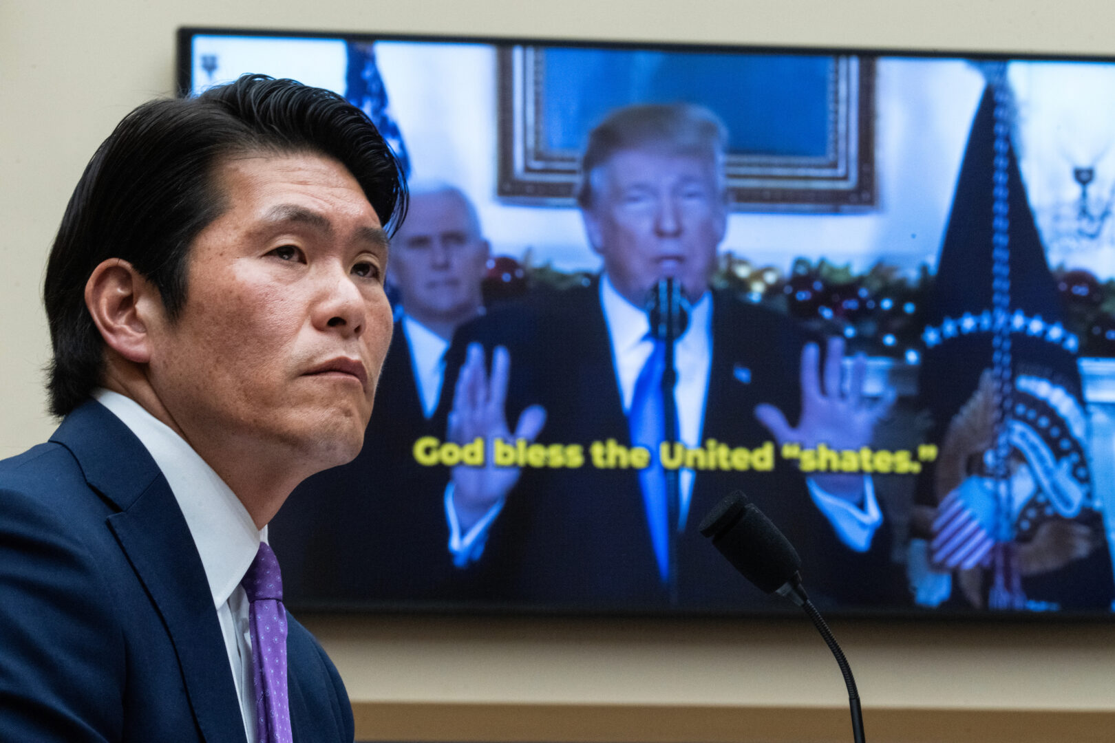 Special counsel Robert K. Hur watches a video of former President Donald Trump during a House Judiciary Committee hearing Tuesday about his report on President Joe Biden’s retention of classified materials as a private citizen.