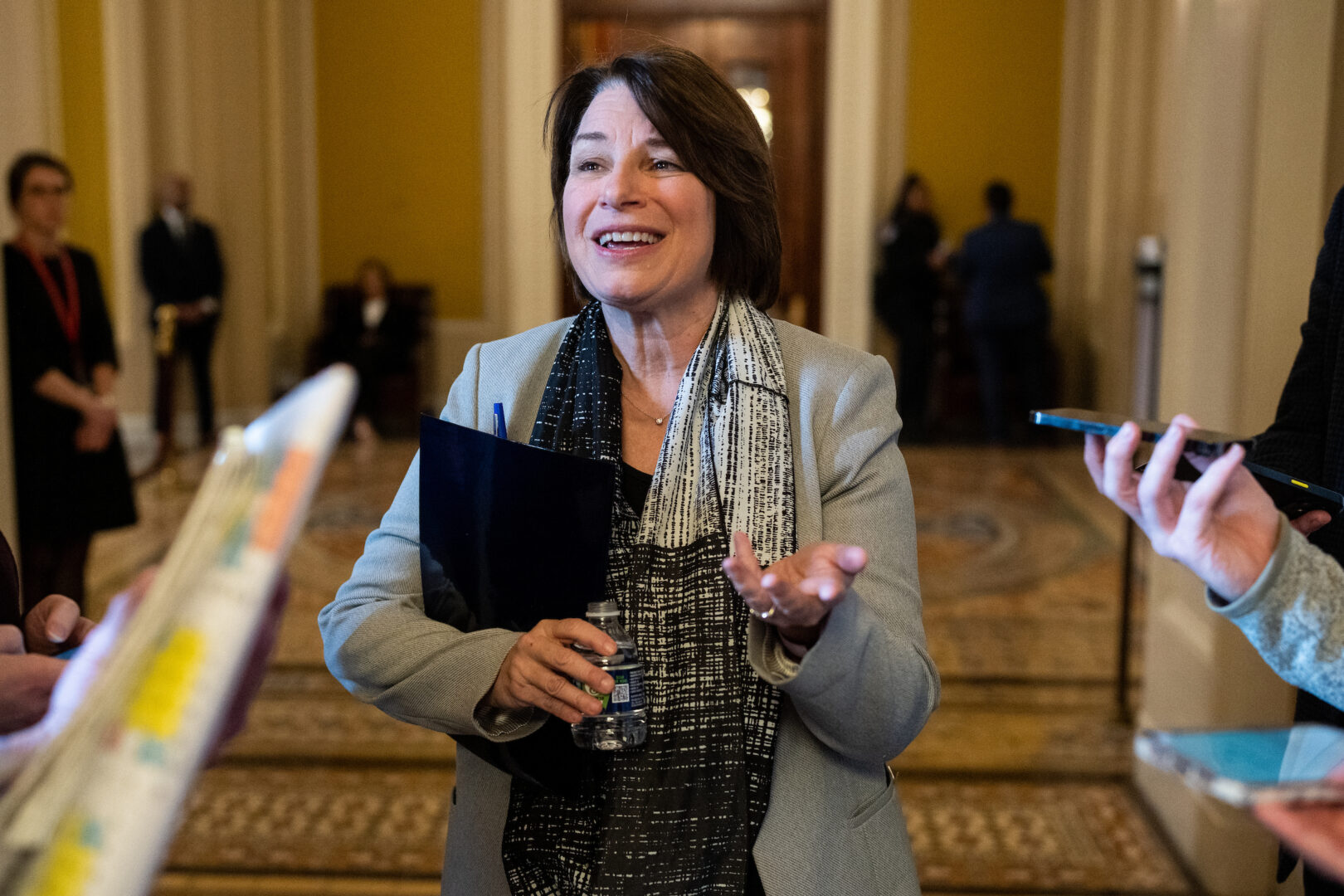 Minnesota Democrat Amy Klobuchar speaks to reporters as she arrives for the Senate Democrats’ lunch in the Capitol.