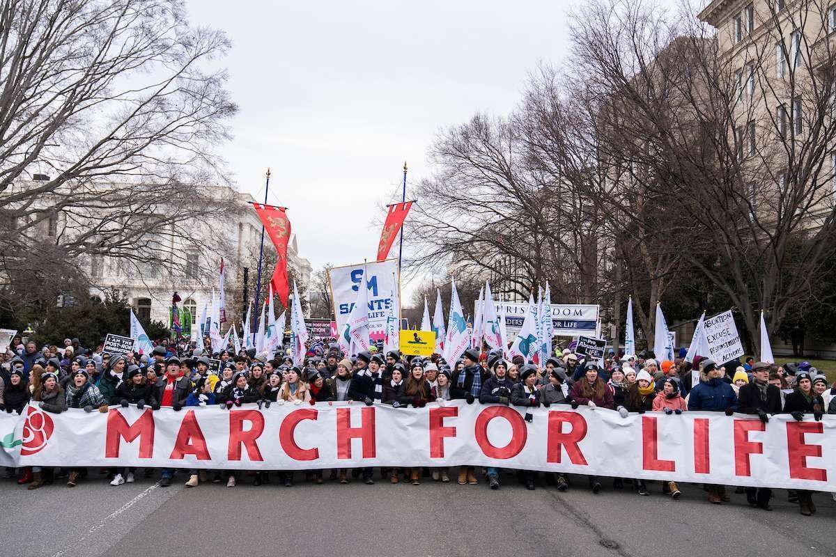 Demonstrators walk on First Street during the 49th annual March for Life anti-abortion demonstration on Capitol Hill on Jan. 21, 2022.