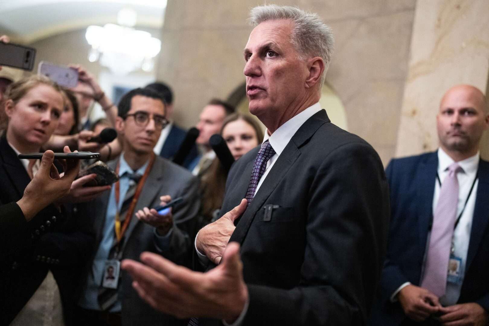 Speaker Kevin McCarthy talks with reporters about the debt ceiling negotiations in the Capitol on Monday.