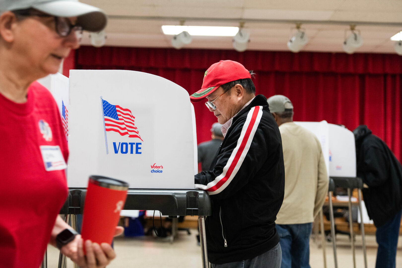 A voter fills out a ballot on primary day at Lewisdale Elementary School in Chillum, Md., on Tuesday. 