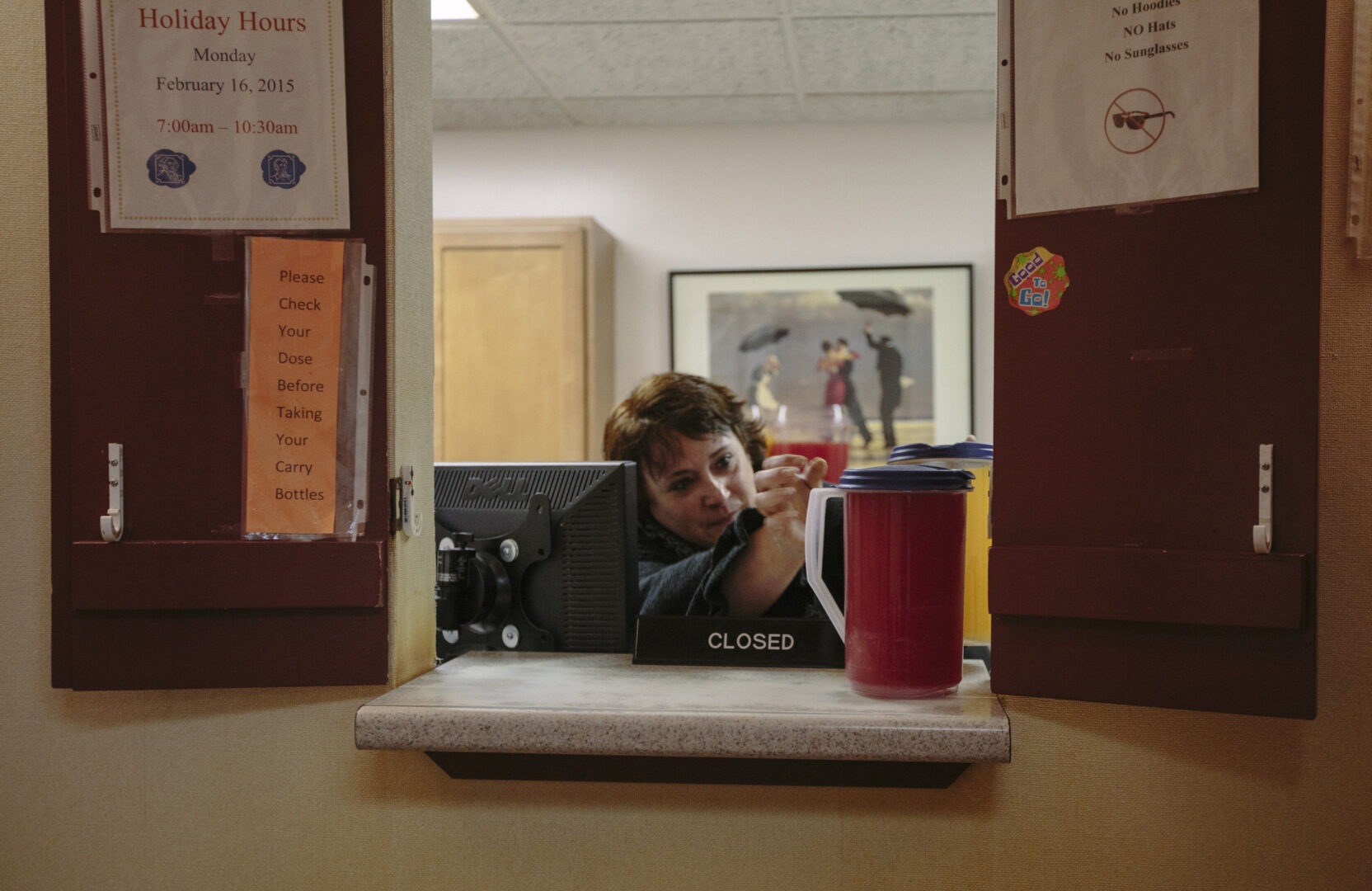 Vanessa Leavitt puts out Tang and Kool-Aid for patients to take with their methadone treatment at CAP Quality Care clinic in Westbrook, Maine.