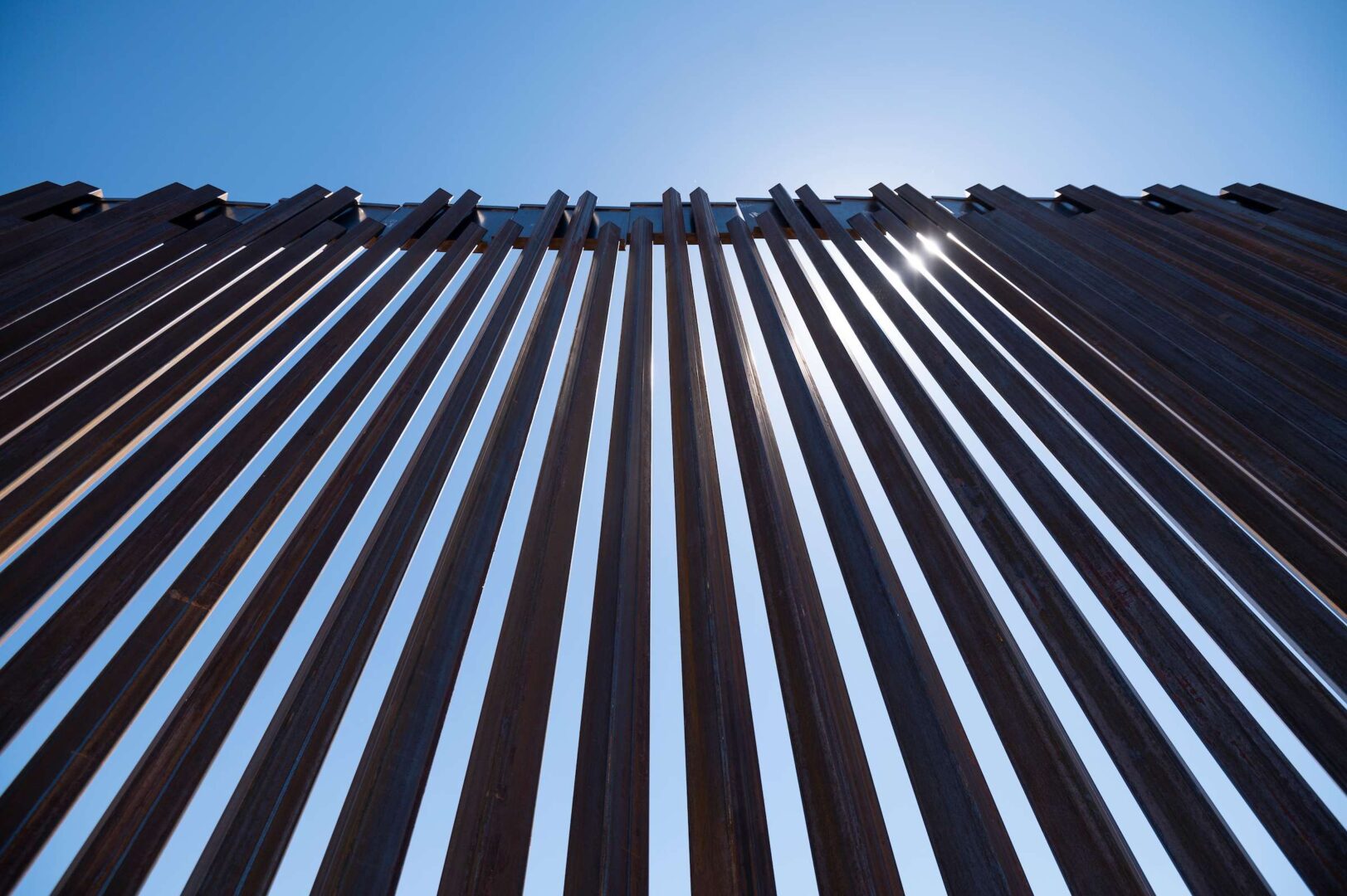 A barrier stretches along the U.S.-Mexico border on the Johnson Ranch near Columbus, N.M., in April 2021. 