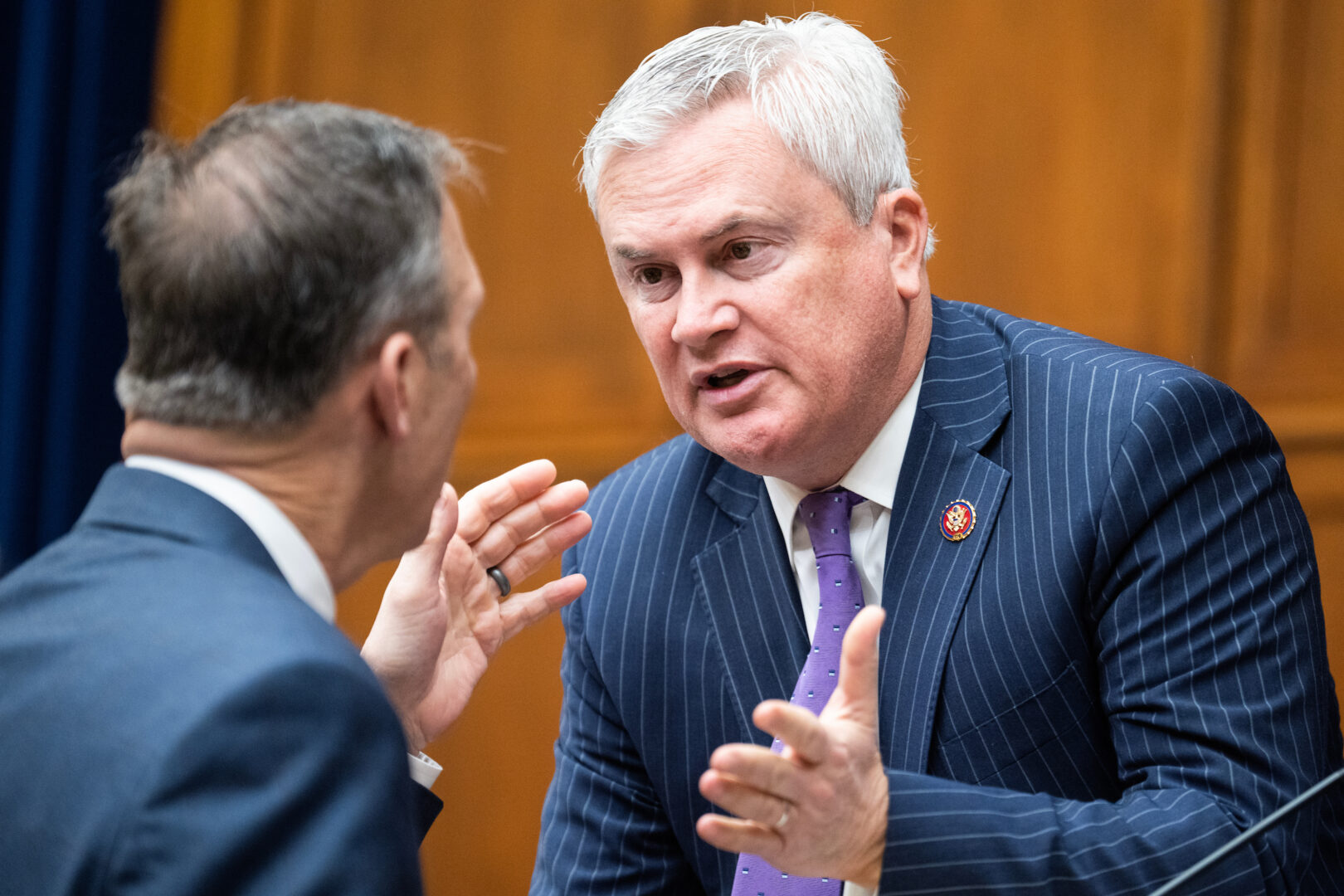 Chairman James Comer, right, and Rep. Scott Perry talk last week before a House Oversight and Accountability Committee markup on a resolution to recommend the House find Hunter Biden In contempt of Congress.