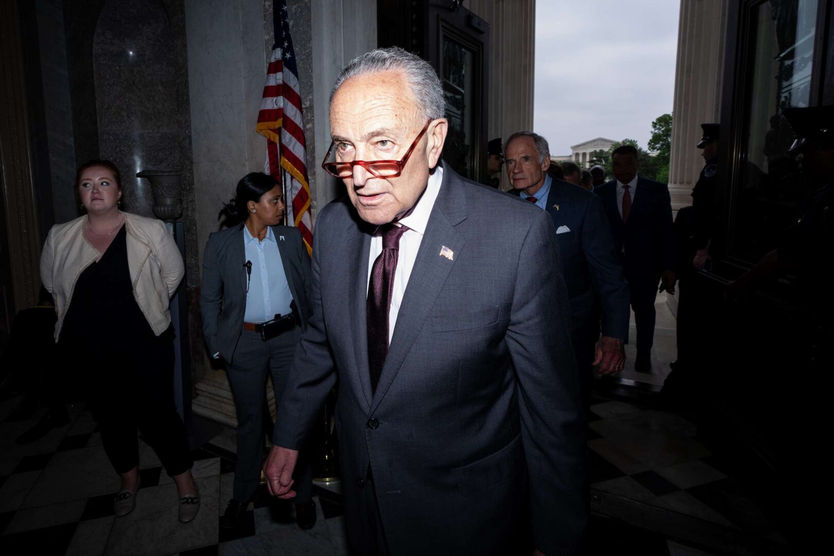 Senate Majority Leader Charles E. Schumer, D-N.Y., walks back into the Capitol on Tuesday after speaking on the Senate steps about a leaked draft opinion indicating the Supreme Court will overturn Roe v. Wade.