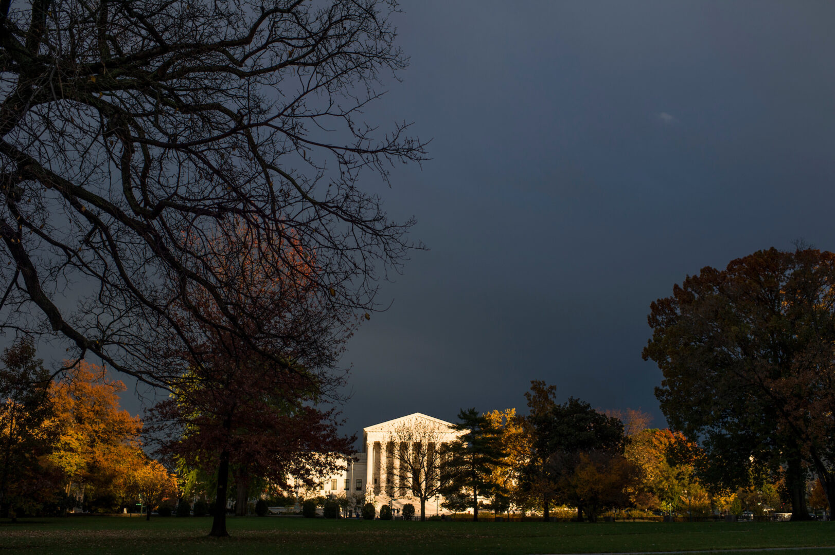 A beam of sunlight breaks through the cloudy skies to illuminate the Supreme Court in Washington in 2014.