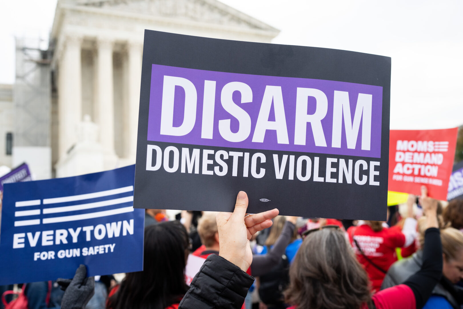 Activists rally outside the Supreme Court in November before the start of oral arguments in the United States v. Rahimi case. 