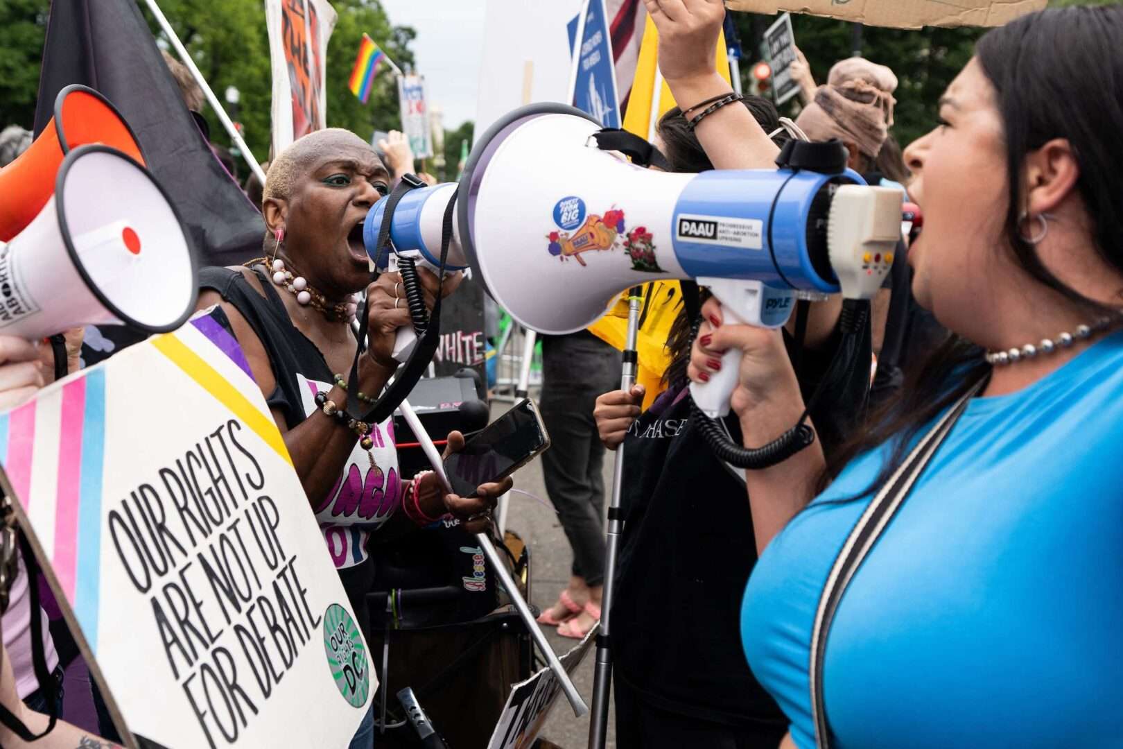 Supporters and opponents of abortion rights shout each other down with megaphones outside of the Supreme Court as they wait for the court to hand down its decision on Dobbs v. Jackson Women’s Health Organization to overturn Roe v. Wade on June 21, 2022. 