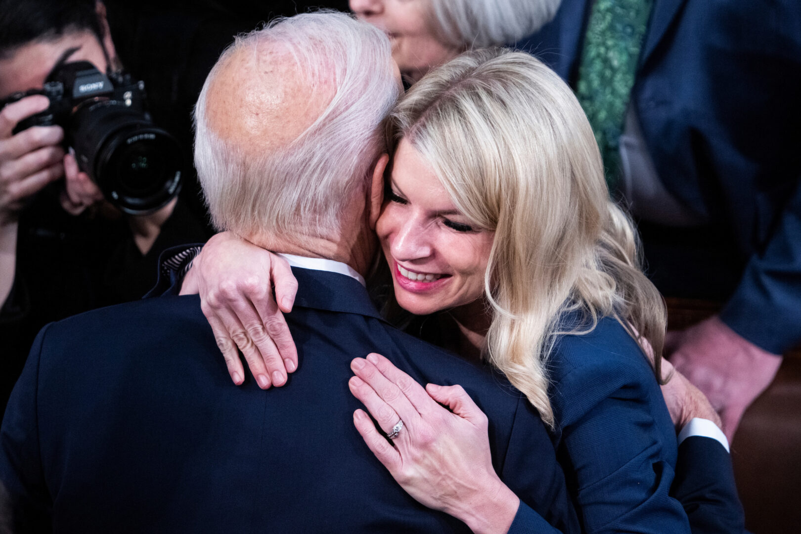 President Joe Biden greets Colorado Democratic Rep. Brittany Pettersen after the State of the Union address in the House chamber on Feb. 7.