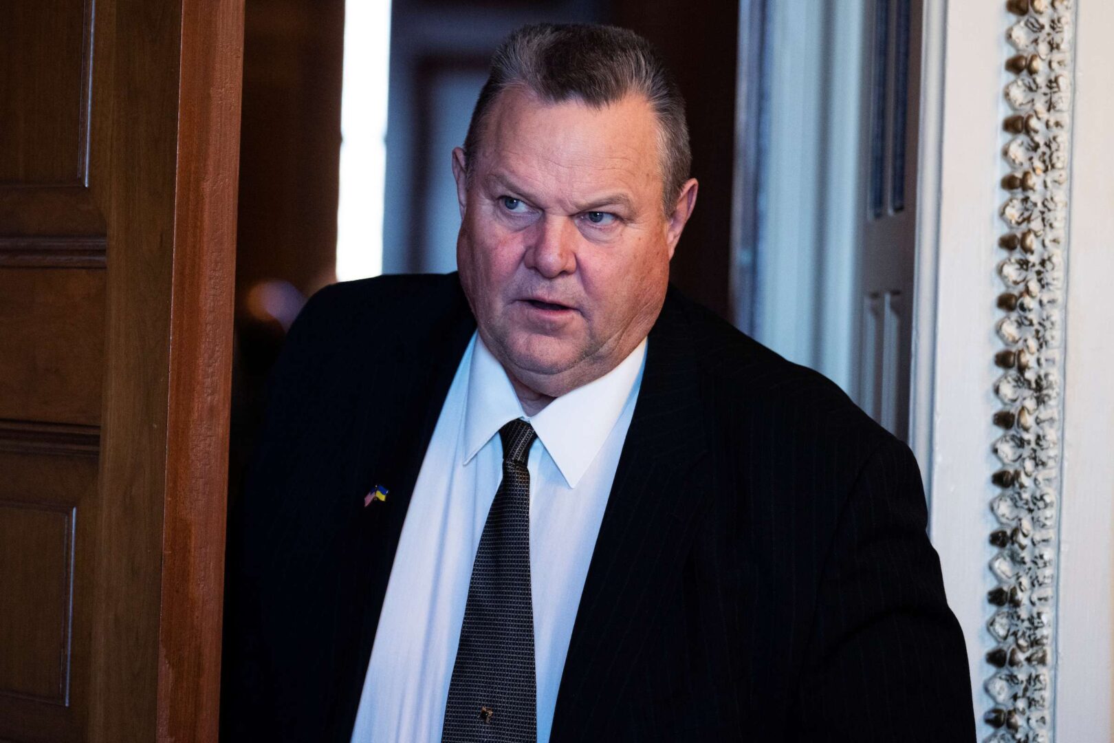 Sen. Jon Tester of Montana, shown on Dec. 13 in the Capitol, joined Sen. Kyrsten Sinema of Arizona on a Title 42 amendment to the fiscal 2023 spending bill. 