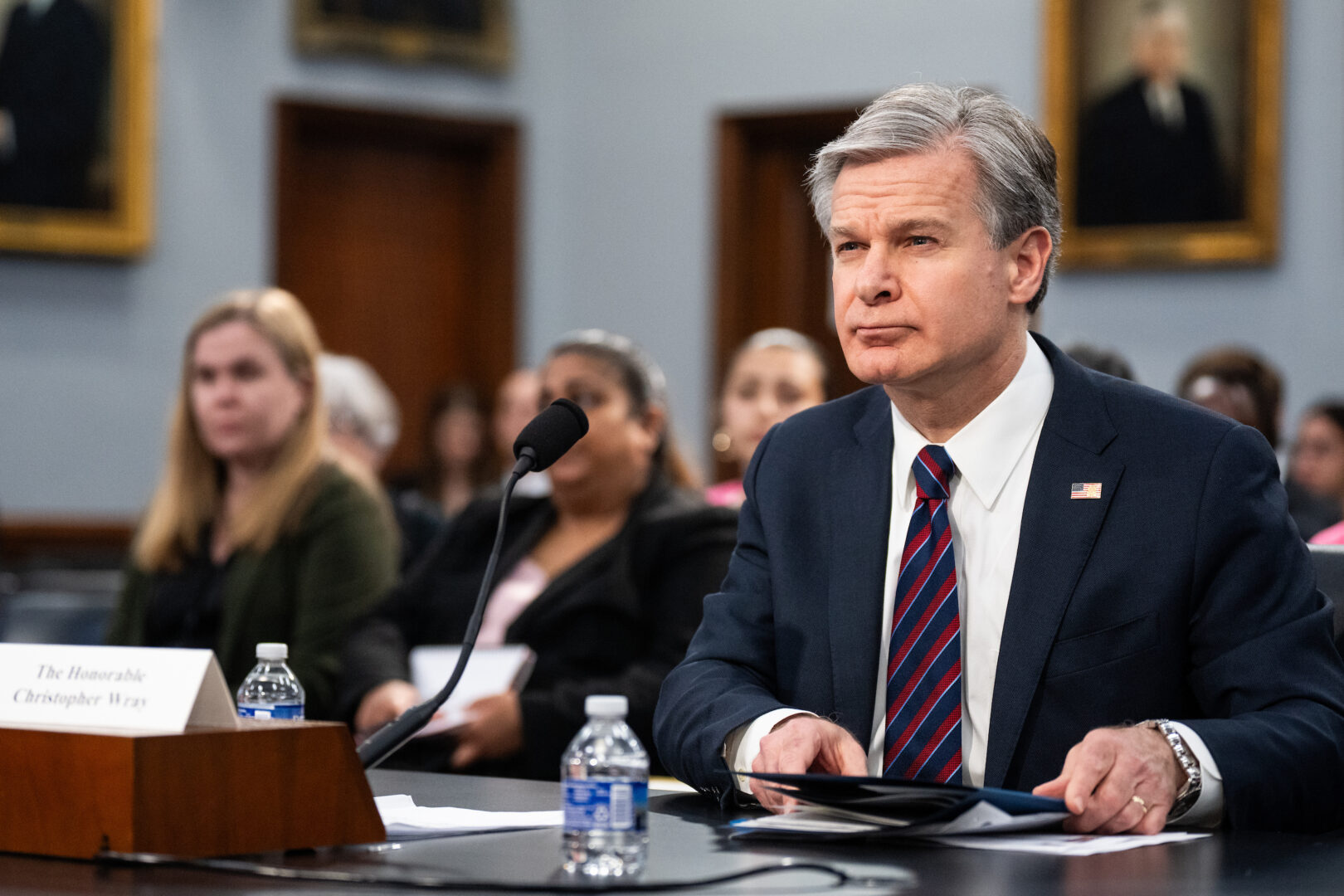 FBI Director Christopher Wray prepares to testify Thursday during a House Appropriations subcommittee hearing.