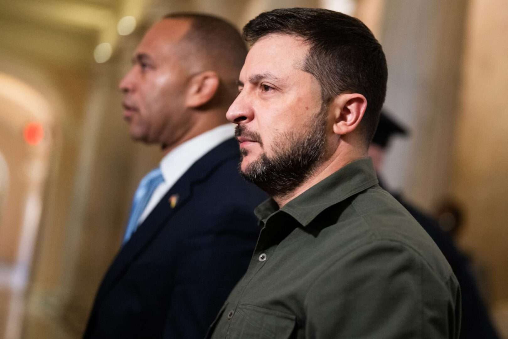 Ukrainian President Volodymyr Zelenskyy arrives to the Capitol with House Minority Leader Hakeem Jeffries, D-N.Y., for a meeting with House members on Thursday.